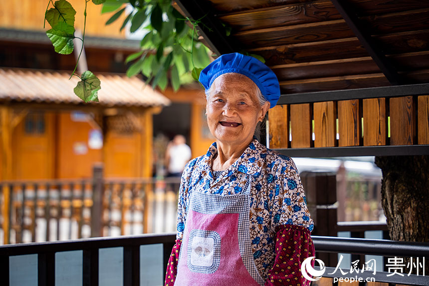 滿臉笑容的團龍村村民。人民網記者 涂敏攝