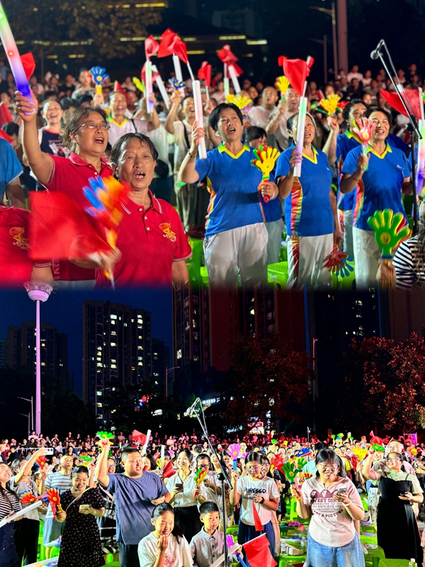 廣場上不同年齡層的市民手持小紅旗、巴巴掌等，在旋律中齊聲高歌，氣氛熱烈。張川 攝.jpg
