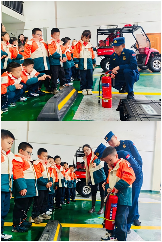 消防員教孩子使用滅火器,孩子實操學(xué)習(xí)滅火技能。.jpg