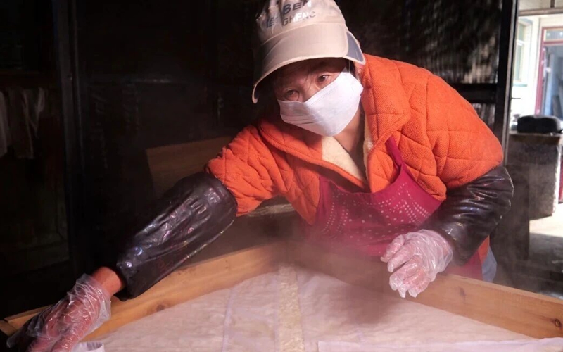 松桃水沖村:傳承百年豆腐干俏銷年貨季。