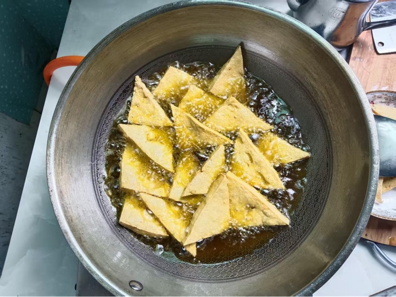 融入生活，成為“家鄉味”。冉光友攝